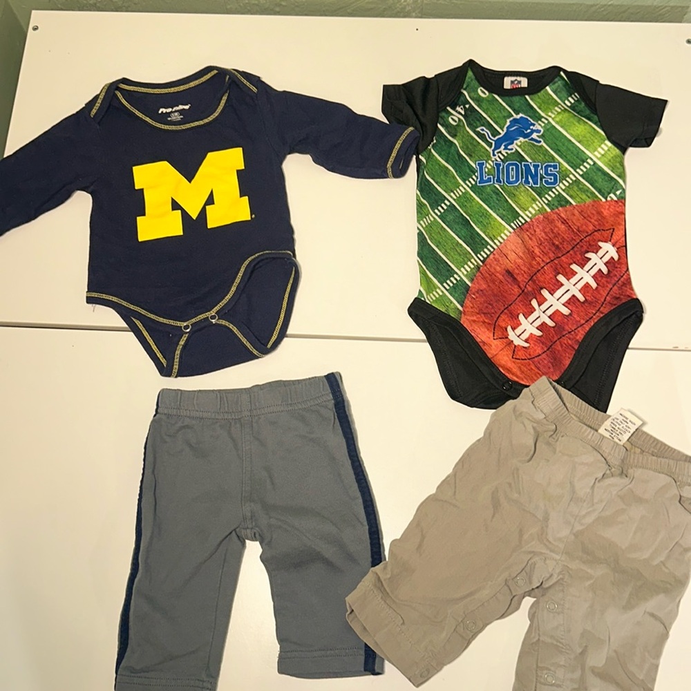 NFL Detroit lions + University of Michigan onesie + two pairs of pants